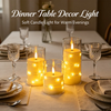 A set of glowing LED star string candles on a dining table for warm evening decor.