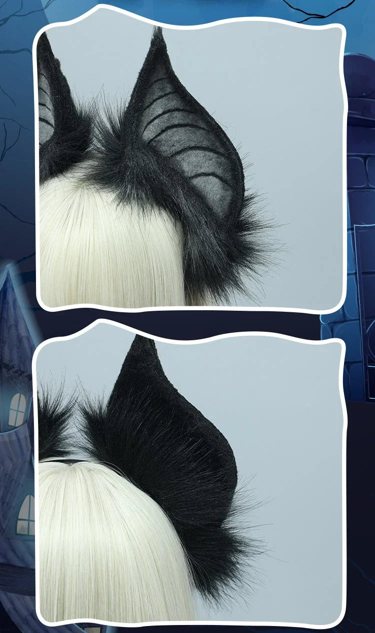 A close-up of a black bat simulation headpiece with white hair, shown against a blue background.
