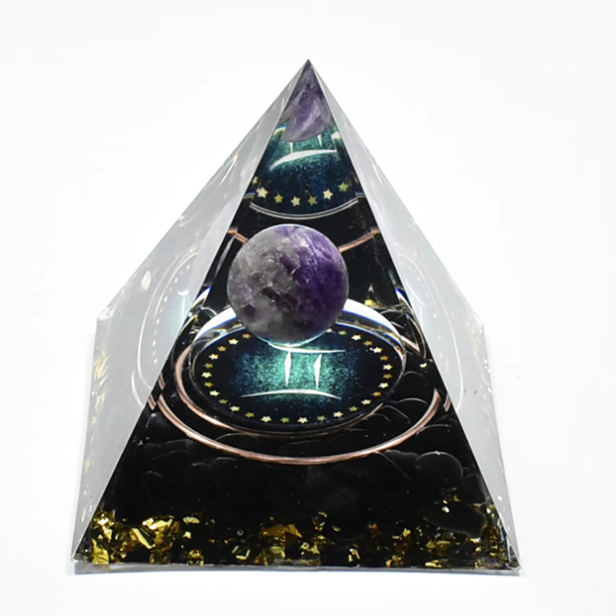 Handmade resin orgonite pyramid with natural obsidian and copper coil set against a dark background