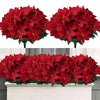 A bouquet of realistic artificial red poinsettia flowers for holiday decor