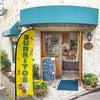 A yellow feather flag advertising Mexican food with the word BURRITOS for a restaurant storefront.