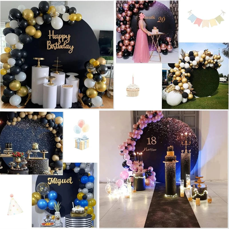 A dark gray and gold balloon photo backdrop decorated with flowers and elegant props for an event.
