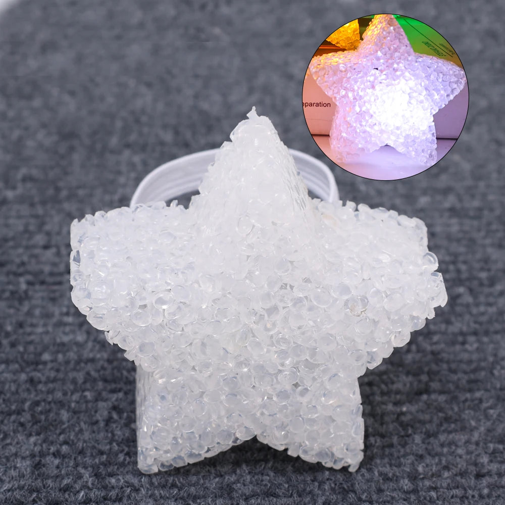 A clear, star-shaped object made of small, translucent plastic pieces is shown next to a magnified view of its glowing LED li