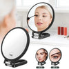 A set of precision dual-magnification handheld mirrors showing different magnification levels.