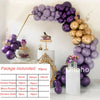 A purple and gold balloon garland featuring various sizes of balloons arranged in an arch shape.