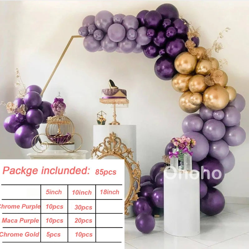 A purple and gold balloon garland featuring various sizes of balloons arranged in an arch shape.