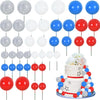 A set of colorful foam ball cake toppers in various colors including silver, white, blue, and red.