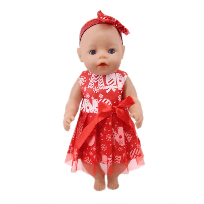 A baby doll wearing a red Christmas outfit with white snowflakes and patterns.