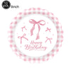 Pink bow themed birthday party supplies set featuring a pink gingham paper plate with a birthday message