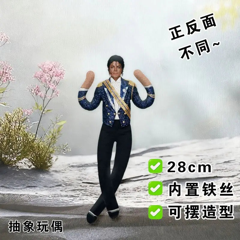 A plush doll dressed in a blue and gold outfit posing against a snowy background.