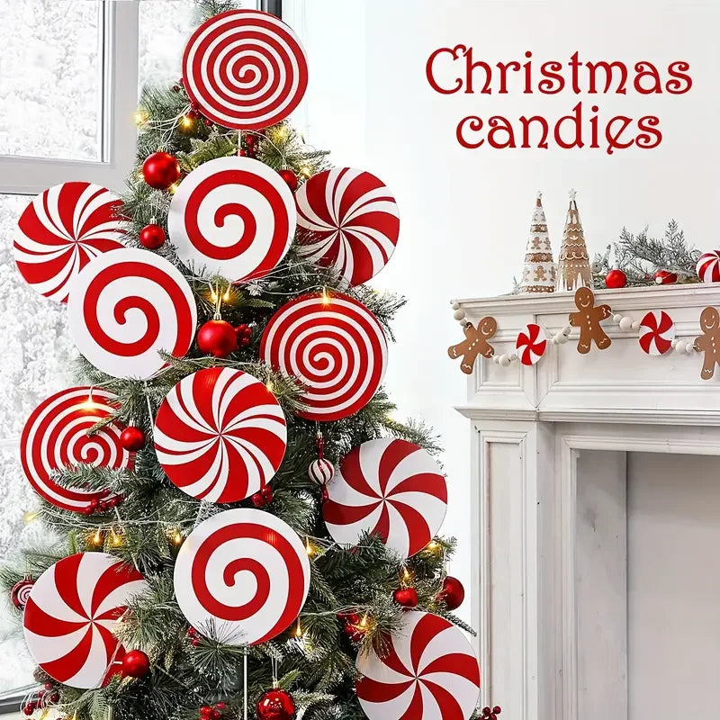 Christmas candies featuring red and white swirl ornaments decorating a festive green Christmas tree.