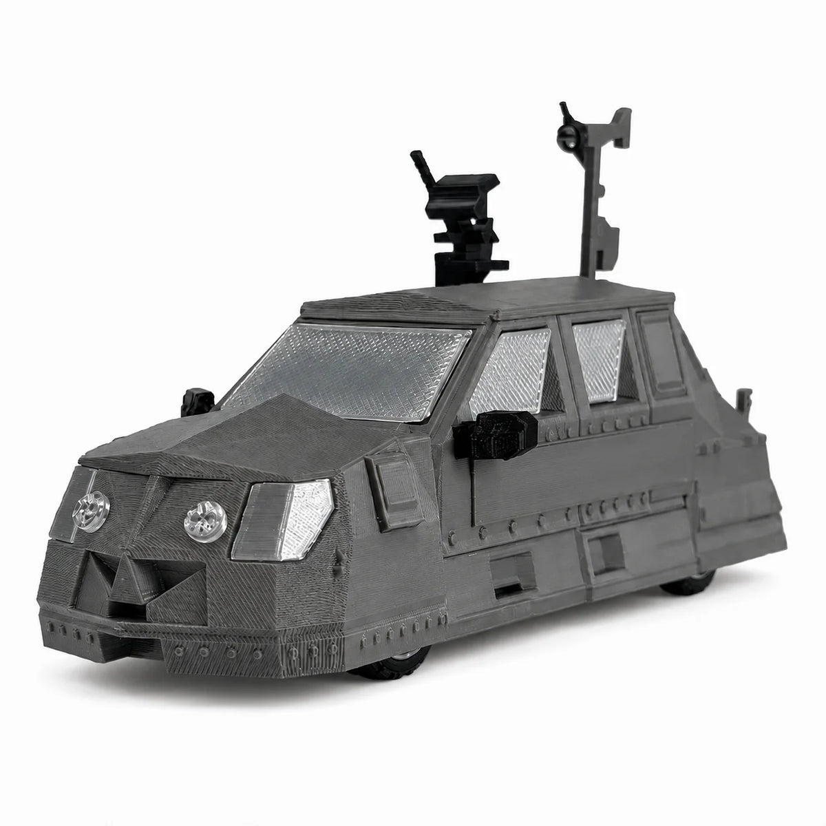 A black model of a Storm Chaser Tornado Interceptor armored car with mounted weaponry.