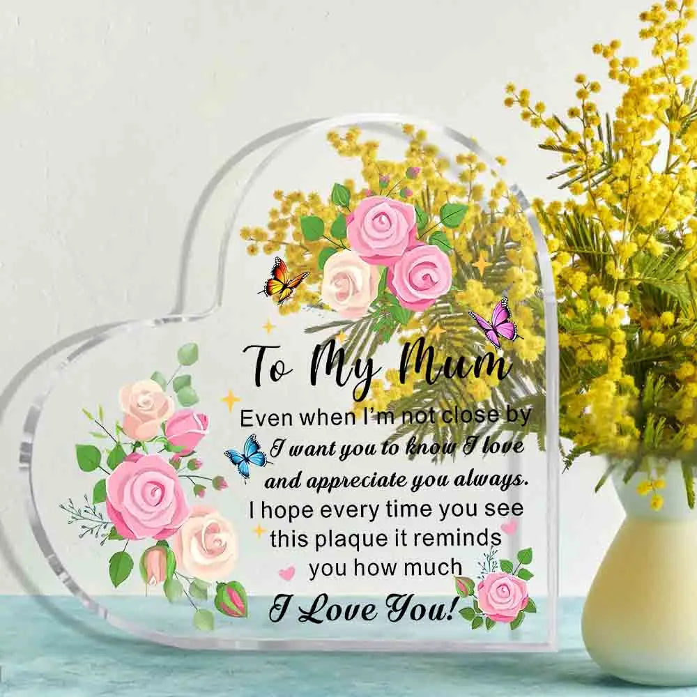 A heart-shaped acrylic keepsake plaque with a floral design and text for mum