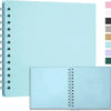 A light blue handmade kraft paper scrapbook with a spiral binding and a color palette swatch on the right.