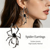 Silver spider earrings displayed on a woman's ear, emphasizing high-quality fashion jewelry.