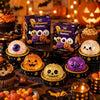 A collection of Halloween simulation baozi ghost dumpling toys and pumpkin decorations displayed on a dark surface.