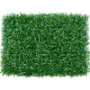 Dense green artificial grass hedge panels used for privacy and decoration
