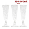 Three clear disposable plastic champagne flutes or party cups shown side by side.
