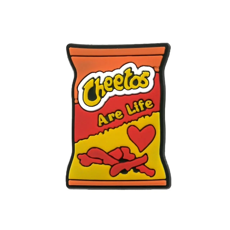 A rectangular plastic charm shaped like a Cheetos bag with the text Are Life on it.