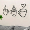 A set of three black iron wall art pieces depicting stylized coffee cups and hearts.