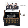 A wooden music box featuring an illustration of Detective Conan characters sitting on a sofa.