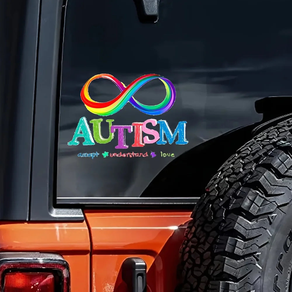 Rainbow infinity autism awareness vinyl decal applied to the window of an orange vehicle.