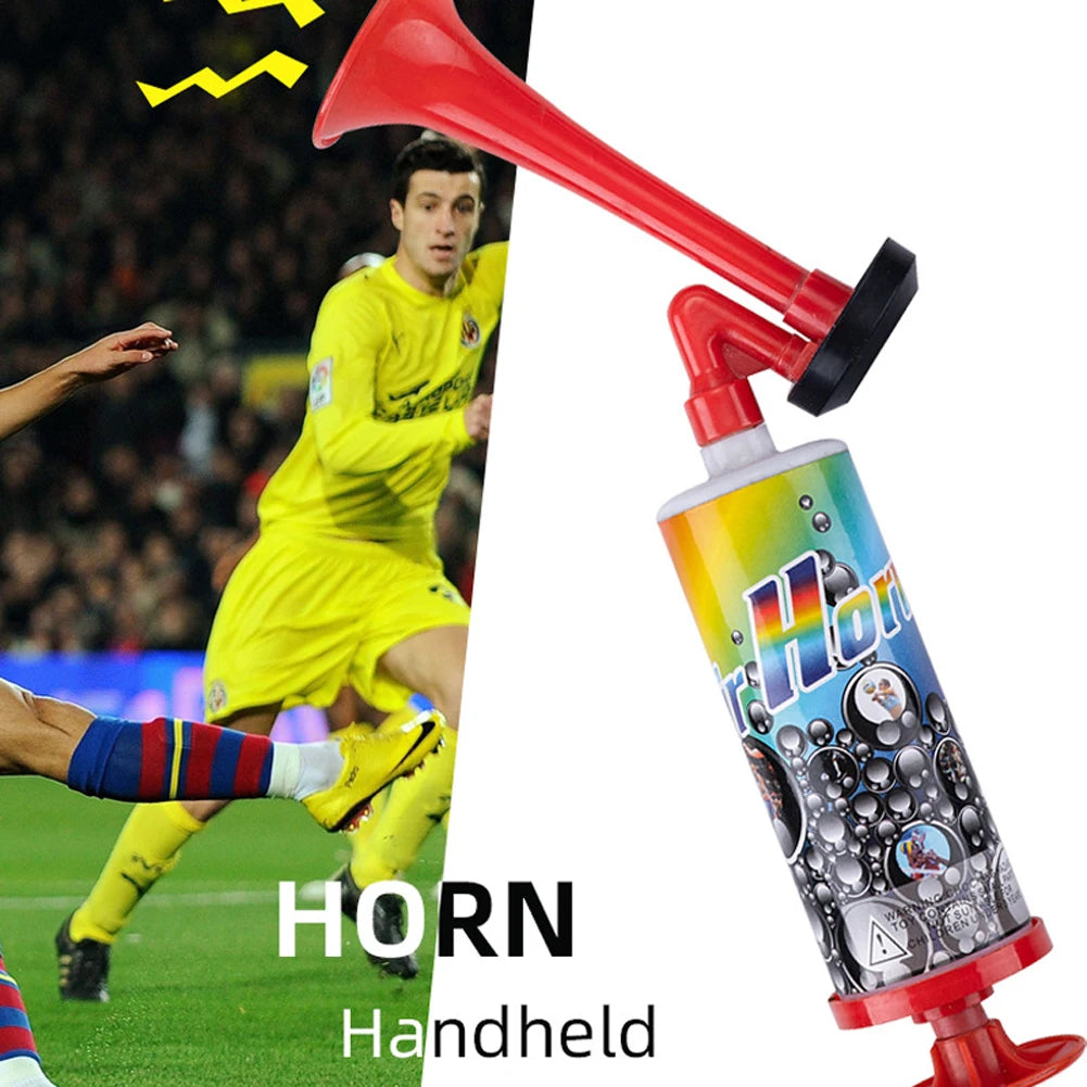 A red handheld air pressure horn is shown next to a soccer player in a yellow uniform.