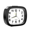A black analog alarm clock face showing the time, with a yellow-green hand pointing towards 10 o'clock.