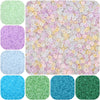A collection of colorful frosted glass rice beads in various shades of pink, yellow, green, and blue.