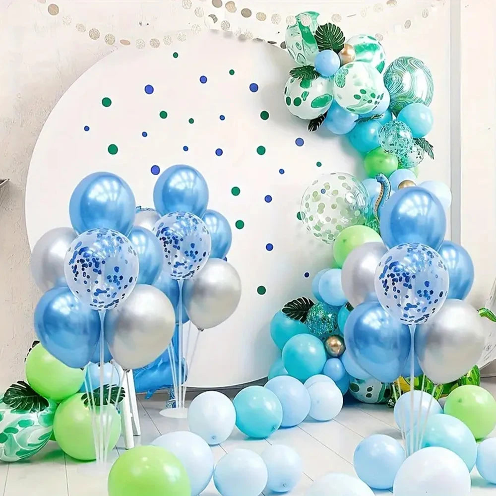 A column of elegant blue and green balloons arranged against a white background.