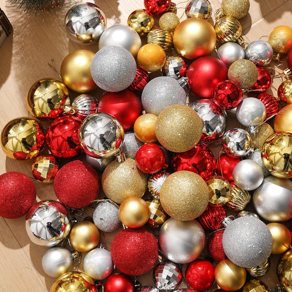 Assorted Christmas tree pendants in various colors and finishes including gold, silver, red, and glitter.