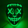 A glowing green LED mask shaped like a skull with a menacing grin, used for Halloween cosplay.