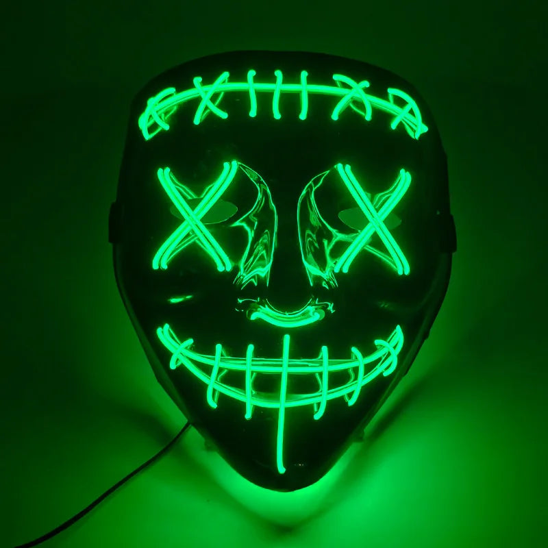 A glowing green LED mask shaped like a skull with a menacing grin, used for Halloween cosplay.