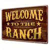 A rustic wooden sign with gold lettering that reads Welcome to the Ranch surrounded by stars.