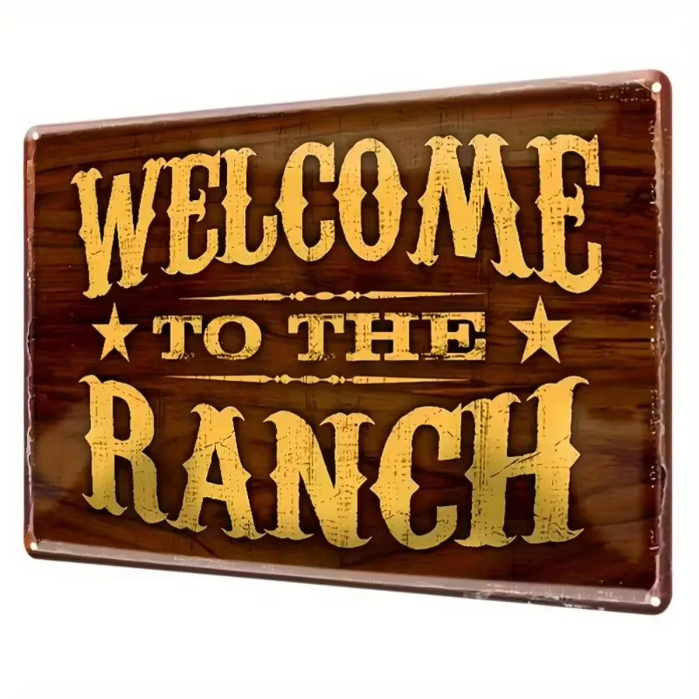 A rustic wooden sign with gold lettering that reads Welcome to the Ranch surrounded by stars.