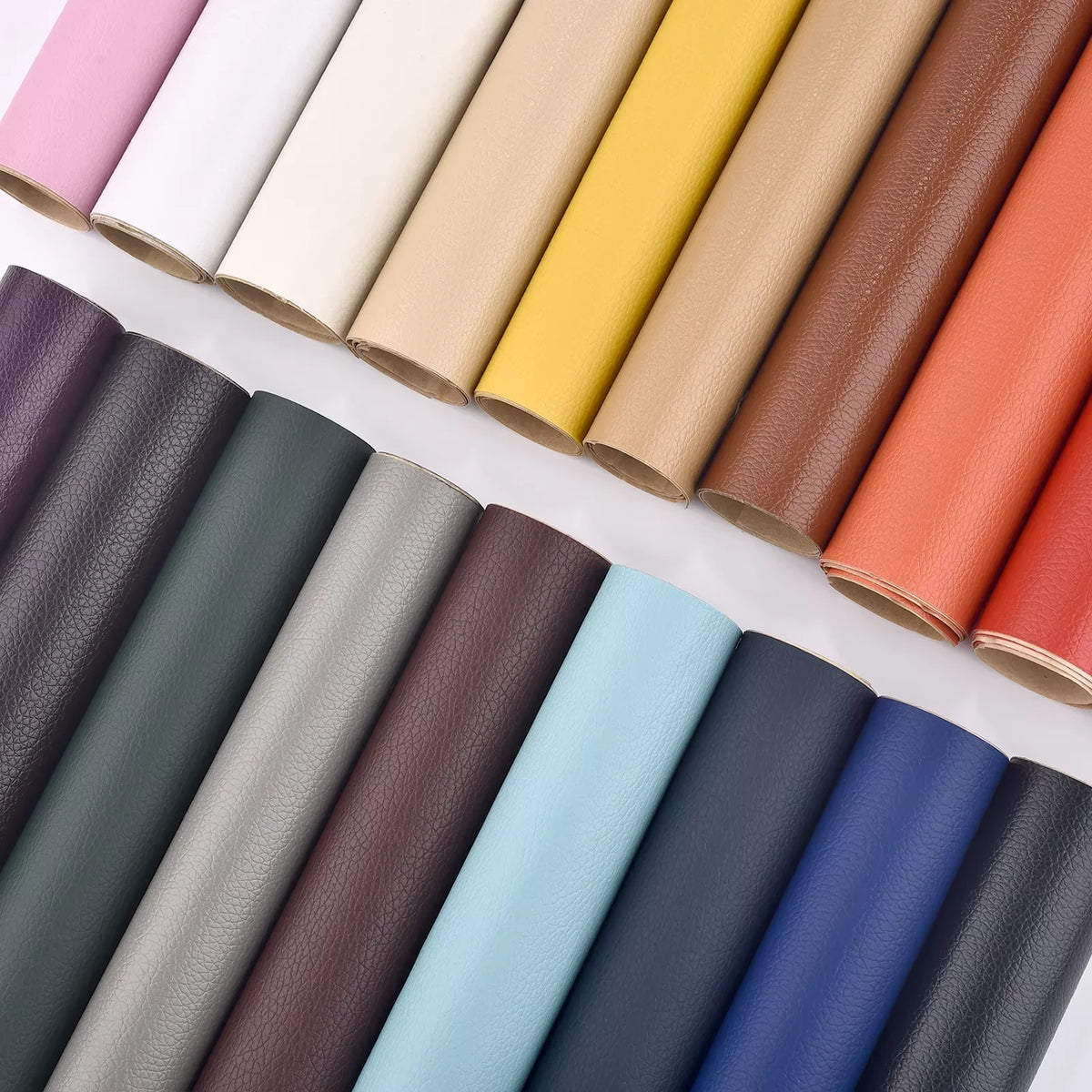 A collection of self-adhesive PU leather repair patches in various shades of pink, yellow, brown, green, and blue.