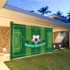 A green soccer field backdrop for a birthday celebration featuring a soccer ball and the text Happy Birthday.