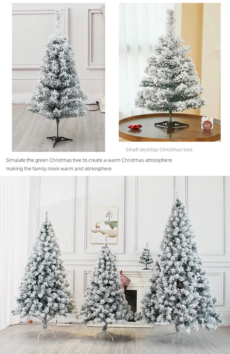 Flocked artificial Christmas trees decorated with snow and greenery in a modern interior setting.