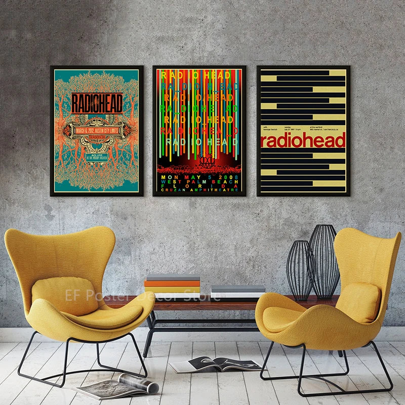 A gallery wall featuring three posters of Radiohead album art in various color schemes and layouts.