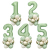 A set of vintage green balloon numbers 1 through 5 for birthday decor