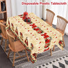 A beige tablecloth featuring a vintage Christmas design with red poinsettia and bell patterns on a wooden table.