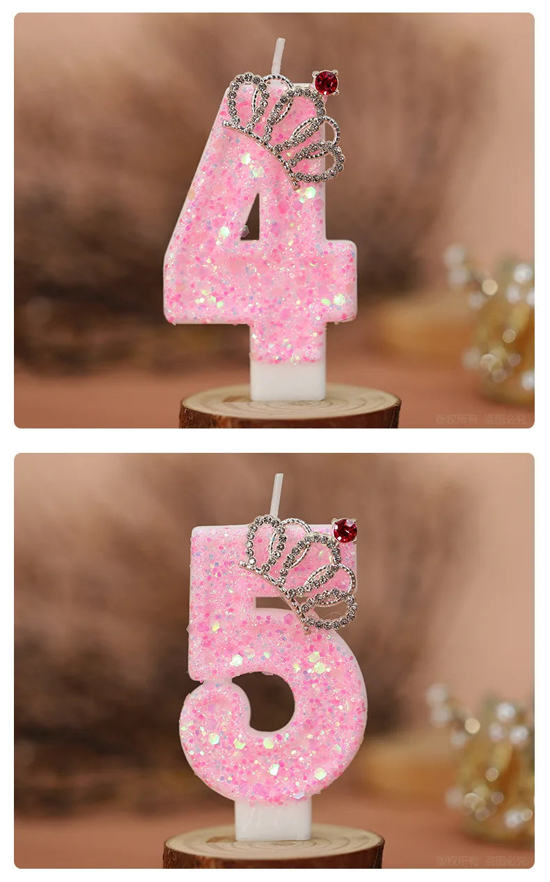 Two pink glitter birthday candles shaped like the numbers 4 and 5 with silver crowns