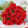 A bouquet of vibrant red artificial silk roses arranged for table decor.