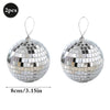 Two silver mirror balls with hanging hooks, measuring 8cm/3.15in each.