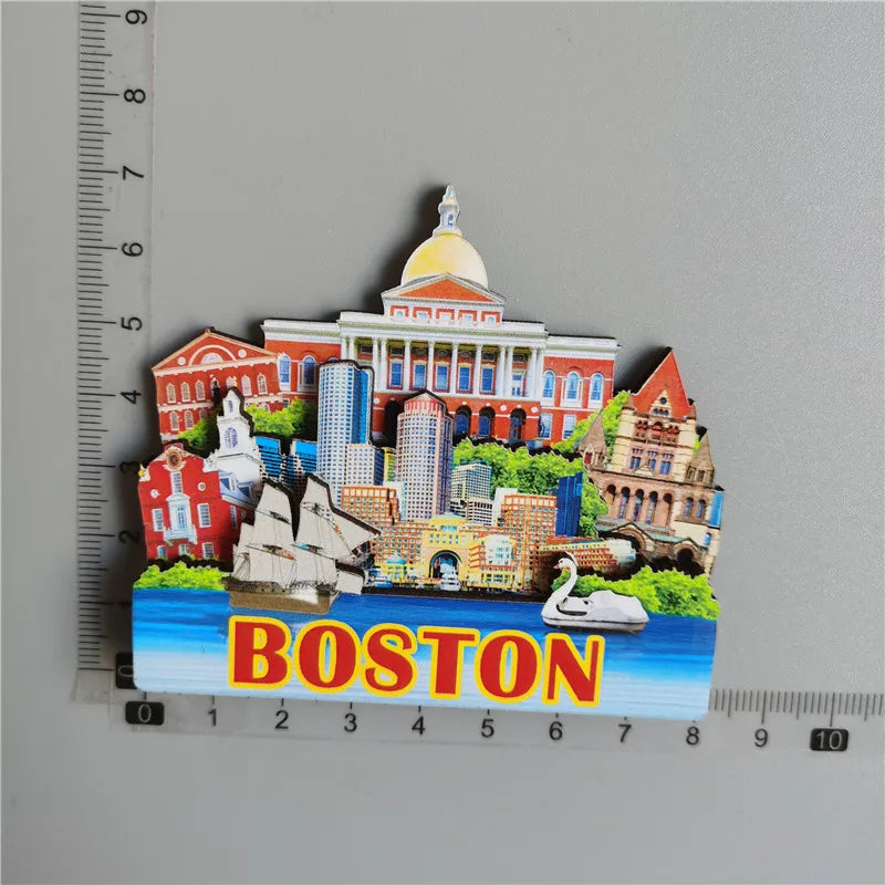 A set of fridge magnets depicting iconic Boston landmarks including the State House and a cityscape.