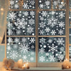 Snowflake window clings decorate a window with intricate white snowflake patterns for holiday decor