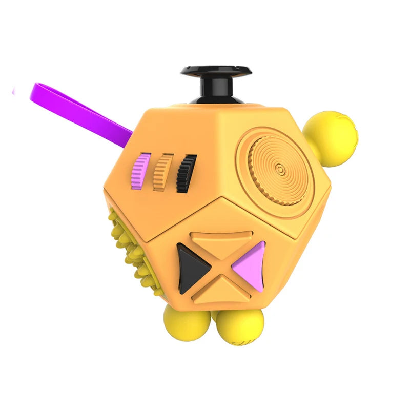 A yellow fidget cube with purple accents and a black top, designed as a sensory desk toy.
