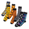 A collection of novelty crew socks featuring tiger, skull, and alien prints in various colors.