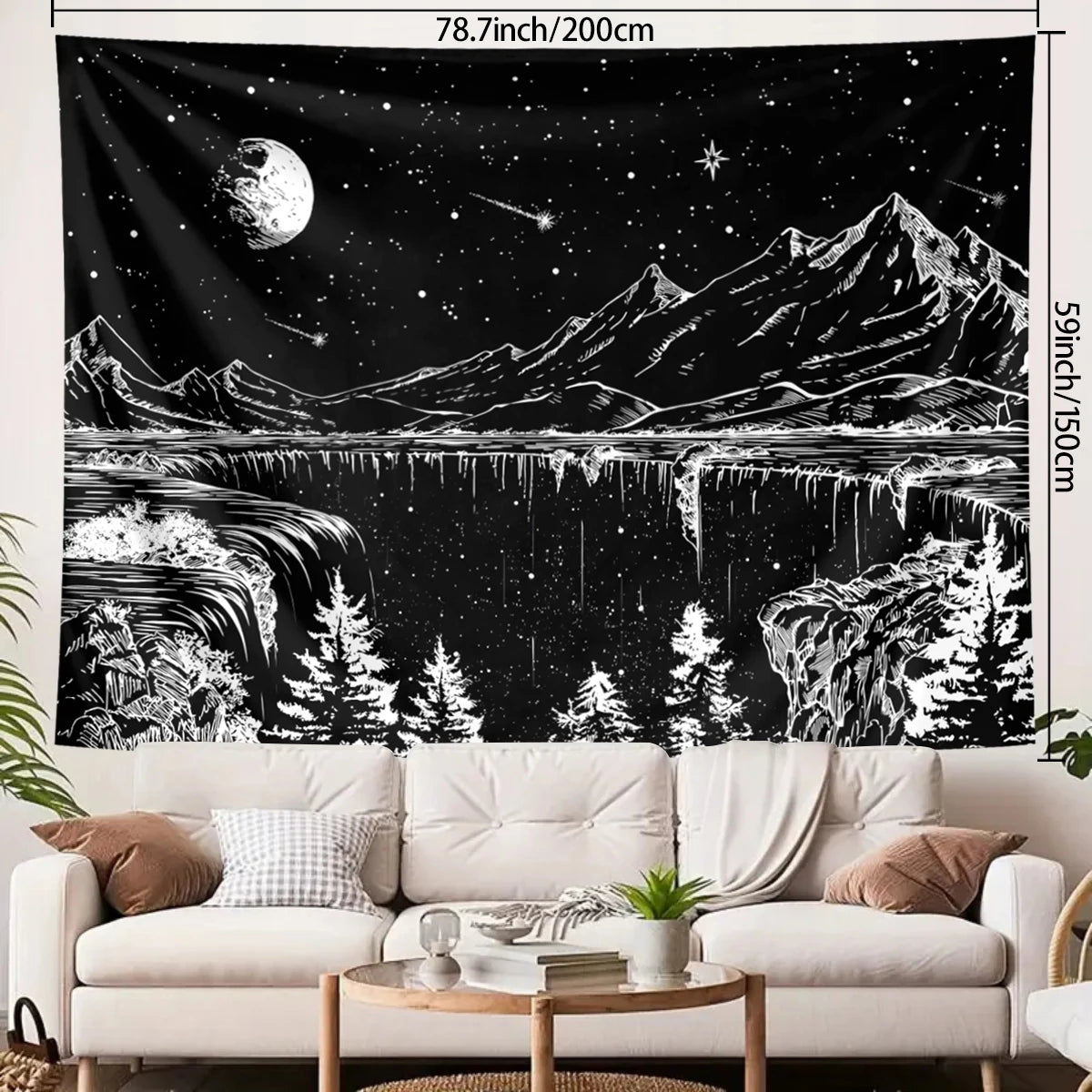 Black tapestry featuring a white silhouette of mountains, water, and stars against a dark night sky