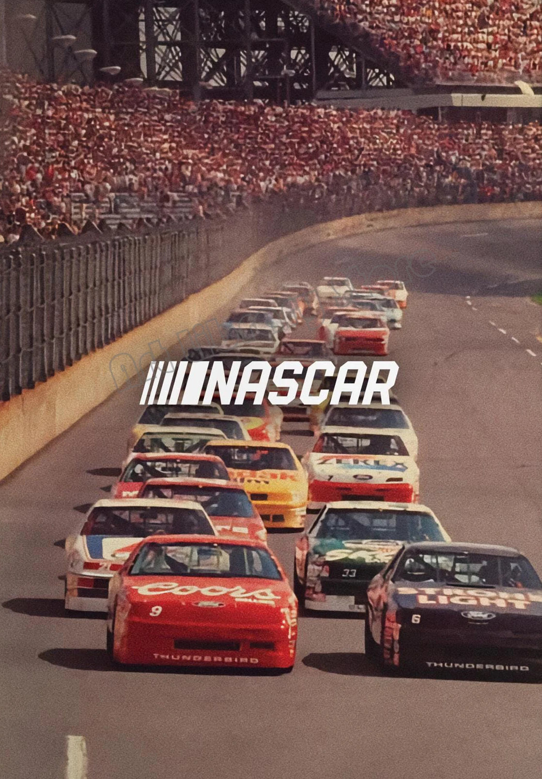 A vintage NASCAR race scene showing multiple cars on the track with a crowd in the background.